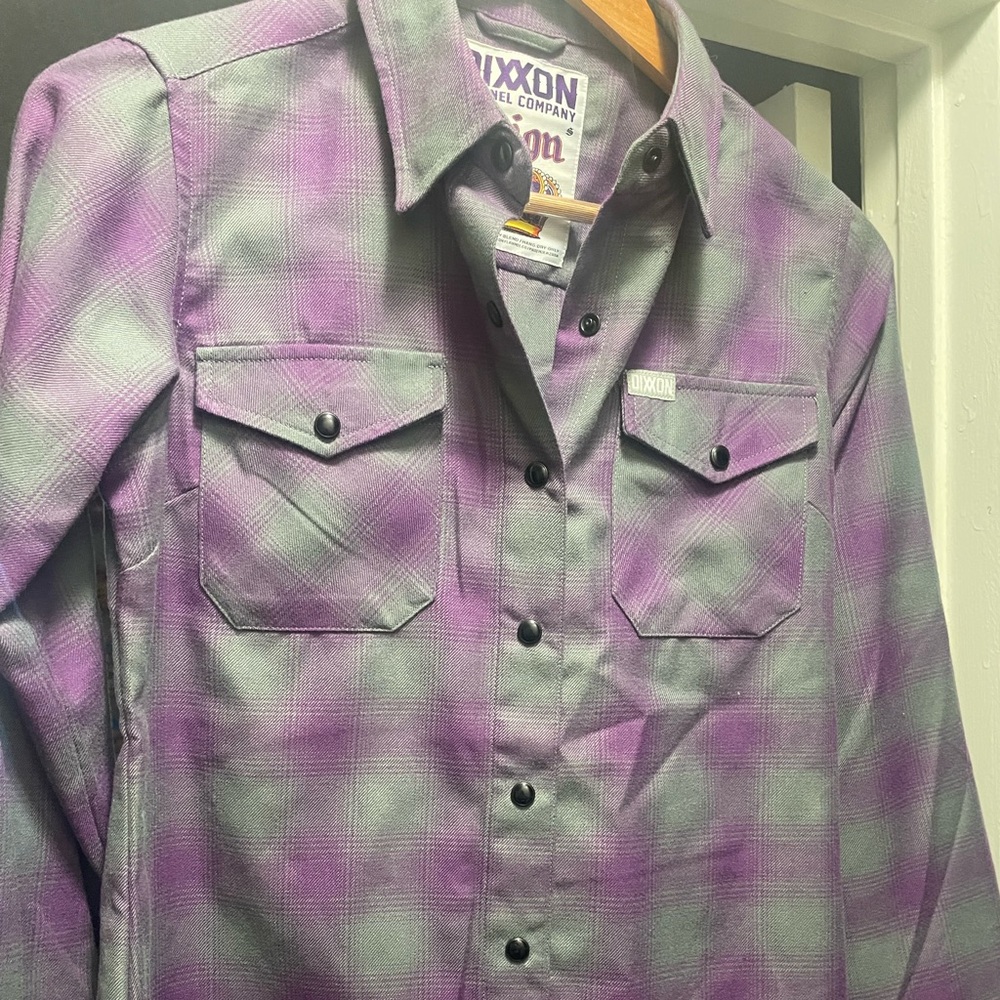 Long sleeve, grey, purple, and in great condition.